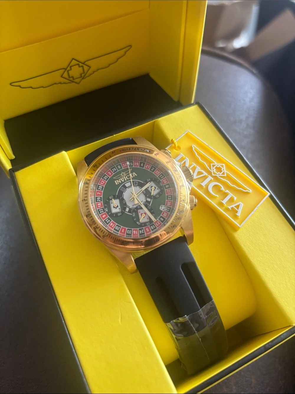 Invicta Gold-Tone Watch with Green Roulette Dial and Black Strap